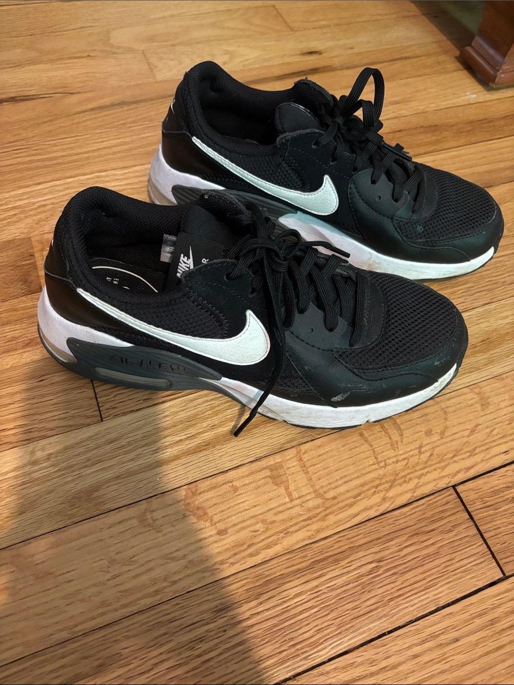 Nike Black and White Athletic Sneakers with Visible Swoosh